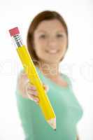 Woman Holding Big Pencil