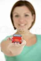 Woman Holding Toy Car