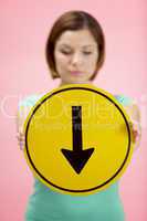 Woman Holding Road Traffic Sign