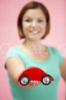 Woman Holding Toy Car