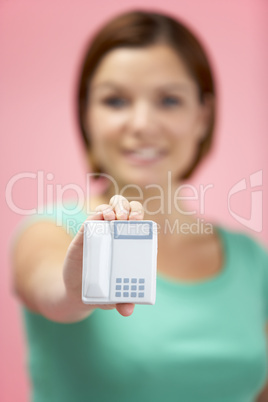 Woman Holding Model Telephone