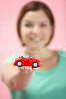 Woman Holding Toy Car