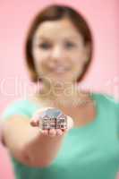 Woman Holding Model House