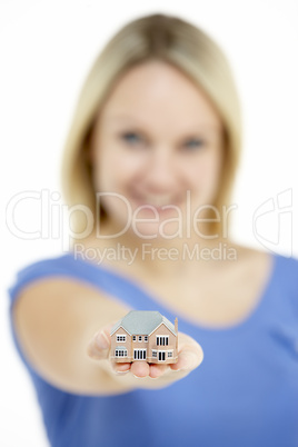 Woman Holding Model House