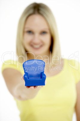 Woman Holding Small Armchair Woman Holding Small Armchair