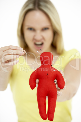 Woman Holding Voodoo Doll