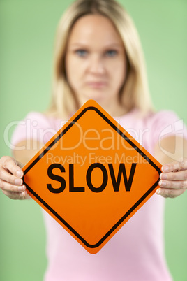 Woman Holding Road Traffic Sign