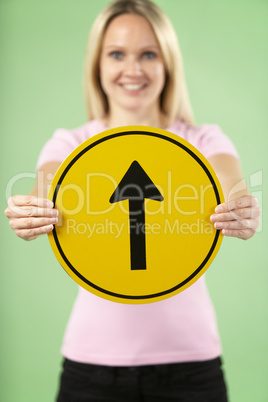 Woman Holding Road Traffic Sign