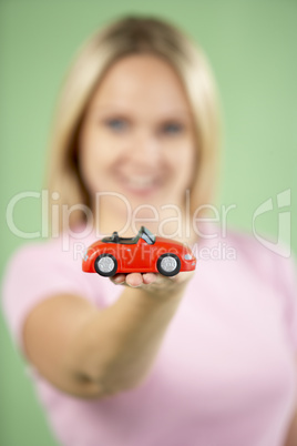 Woman Holding Toy Car