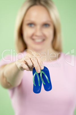 Woman Holding Small Beach Sandals