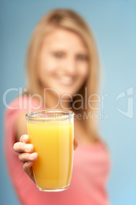 Teenage Girl Holding Glass Of Juice