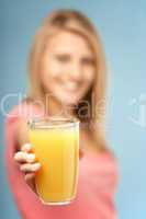 Teenage Girl Holding Glass Of Juice