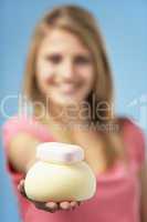 Teenage Girl Holding Soap And Sponge