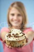 Teenage Girl Holding Cream Cake