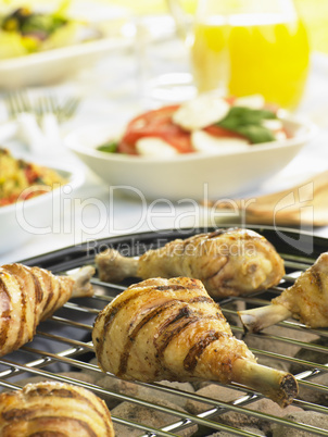 Chicken Cooking On A Grill