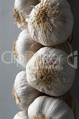 Garlic Cloves Hanging From String