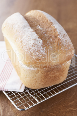 Fresh Bread Loaf Cooling On Wire Rack