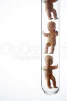 Baby Figurines In Test Tubes