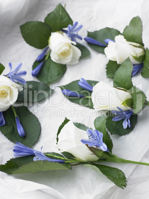 Box Filled With White Rose Corsages