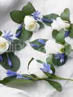 Box Filled With White Rose Corsages