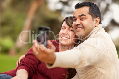 Attractive Mixed Race Couple Taking Self Portraits