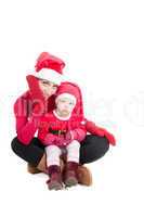 Santa mother and daughter in studio