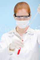 Flu virus vaccination research - woman scientist in laboratory