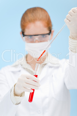 Flu virus vaccination research - woman scientist in laboratory