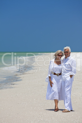 Happy Senior Couple Laughing on Tropical Beach