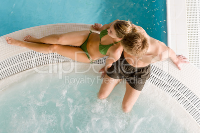 Top view - young couple relax in swimming pool