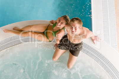 Top view - couple relax in swimming pool