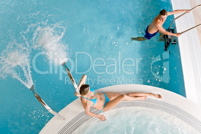 Top view - couple relax in swimming pool