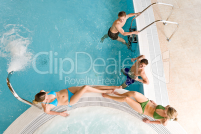 Top view - young people relax in swimming pool