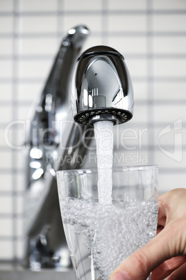 Filling glass of tap water