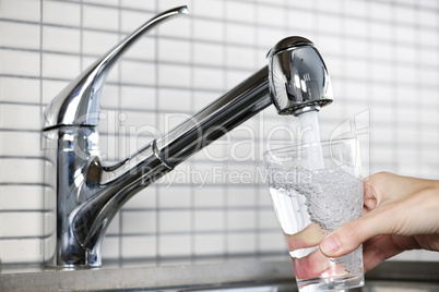 Filling glass of tap water