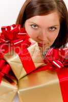 Happy woman holding Christmas presents