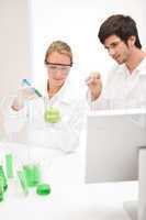 Genetic engineering - scientists in laboratory