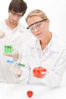 Genetic engineering - scientists in laboratory