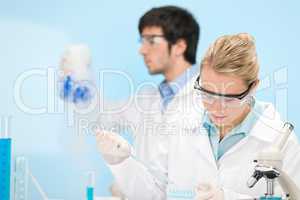 Flu virus experiment -  scientist in laboratory