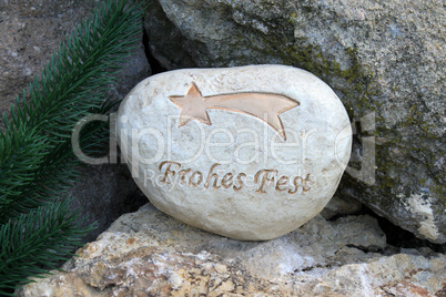 Stein mit der Inschrift Frohes Fest