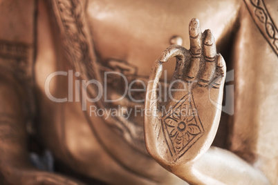 Die Hand des Messing-Buddhas
