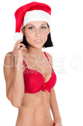 Portrait of beautiful woman in red santa hat