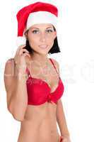 Portrait of beautiful woman in red santa hat