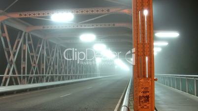 Street bridge in a fog