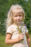 blonde girl with wild flowers