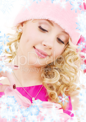 cheerful santa helper girl with gift box