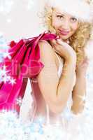 cheerful santa helper girl with shopping bags