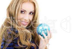 happy woman with blue christmas ball