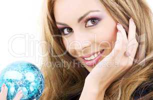 happy woman with blue christmas ball
