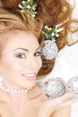 lovely woman with christmas balls